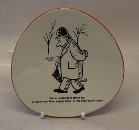 Knabstrup triangular plate ca 16 cm Storm P: Theese sad days will once be "The good old days"