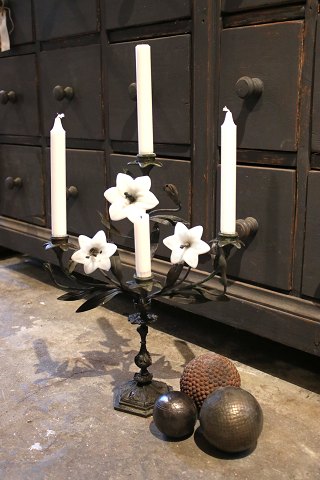 Antique, French candlestick in dark patinated bronze, decorated with 3 old white glass flowers...