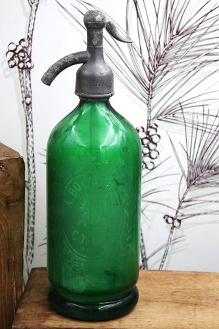 Decorative old French glass siphon green color from old café...