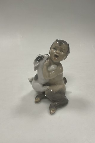 Royal Copenhagen Figurine og Faun with Dog No 2823