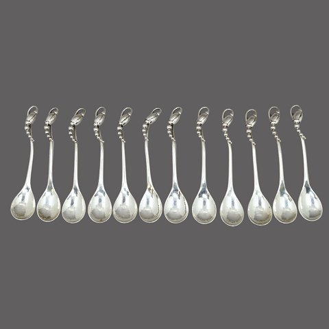 Georg Jensen; Sæt af 12 Magnolia kaffeskeer i sterlingsølv
