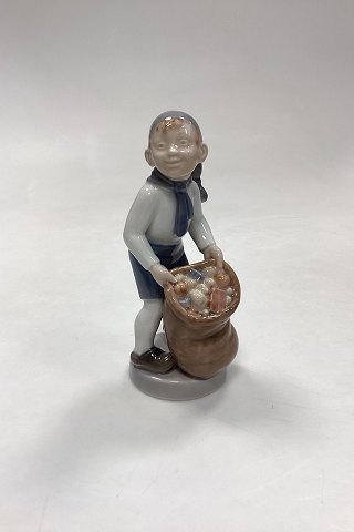 Royal Copenhagen Monthly Figurine December - Boy with Christmas Sack No. 4534