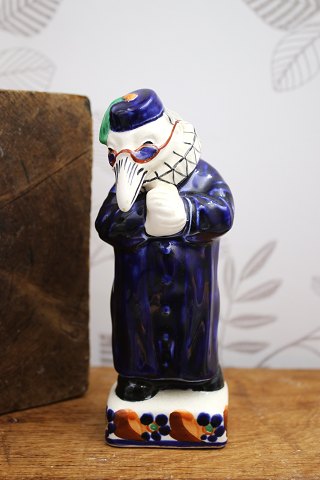 Ravnen (Præsten), fajance figur fra Aluminia "I skoven skulle være gilde" designet af Kai Nielsen i 1908.