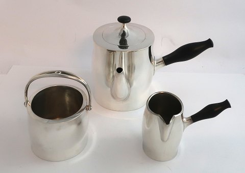 Hans Hansen. Design, Karl Gustarv Hansen. Model 566. Tea service in sterling silver, consisting of teapot, sugar bowl and creamer. Teapot no.4 and sugar bowl-creamer no.1. Produced 1978 1979.