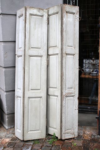 A pair of decorative old French shutters with original light grey patinated colour...