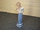 Kgl. figur dame med baby, nr. 052, i første sortering. 5000 m2 udstilling.