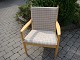 En hvilestol i bøgetræ tegnet af Hans Wegner model 1788 lavet til tremme sofaen i fin stand5000 m2 udstilling