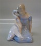 B&G figurB&G 2021 Pige med svane iført kongekrone - de vilde svaner 16,5 x 13 cm H.C. Andersen figurer