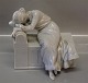 Royal Copenhagen figurine 349 RC Woman crying on a chair  17 x 21 cm
