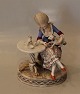 Royal Copenhagen 12127 Over glaze Lady with table 