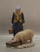 B&G figurB&G 2237 Bondekone med gris 22,5 cm Axel Locher