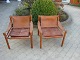 2 hvilestole tegnet af Arne Norell i brunt kernelæder med patina model safari i fin stand 5000 m2 udstilling 