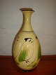 Vase af Herman kähler.Højde. 27 cm og  i perfekt stand.5000m2 udstilling.