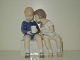 Bing & Grondahl FigurineBoy and Girl on BenchDec. Number 2175