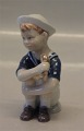 Royal Copenhagen figurine 0680 RC Boy "Jens" with icecream 12 cm (2021680)