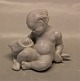 B&G hvid figure B&G 4037 Havbarn læner sig op ad fisk 8 cm Venus Fødsel