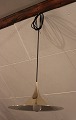 Gubi semi loft lampe i messing designet af Claus Bonderup.  5000m2 udstilling.