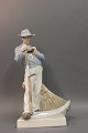 Kgl. figur nr 685, mand med le. Højde 26 cm. 