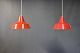 Et par klassiske røde arbejdslamper fra Louis Poulsen.5000m2 udstilling.