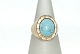 Gold ring with light blue stones 14 CaratSize: 56