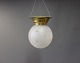 Loftlampe i messing med mat sleben kuppel.5000m2 udstilling.