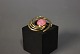 14 ct. gold brooch with a rosa quartz.