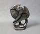 Enkel skulptur lavet af fedtsten. 