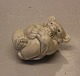 Royal Copenhagen Stoneware 21434 RC Celedan glazed bear cub - sucking paw on back 5 x 8 cm