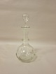 Karaffel, glas, med propCa. 1920Med oliven-slibningH: 22cm inkl. propVi har et stort udvalg af antikke glas, karafler og kander