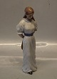 Royal Copenhagen figurine 050 RC Lady Walking with Hat Behind Her, 26 cm (1249050) Scandinavian women series, Allan Therkelsen