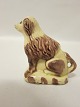 Dog made of clay, antiqueThis dog is supposedly a dog which was ment to be made as a savings boxPlease note: There is a imperfection on the bag of the dog, and it is supposed to be from the production (se foto)