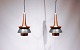 Et par loftpendler i mørkegrå metal skærme og kobber af Jo Hammerborg fra 1960erne.5000m2 udstilling.