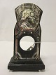 Holder for the watchThis old/antique holder is made of wood and decorated with brass, on which is written "Beethoven"The holder is originally made for a lady pocket watchH: 14,5cm, W: 8cm