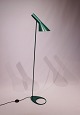 Grøn gulvlampe designet af Arne Jacobsen i 1960 og fremstillet af Louis Poulsen.5000m2 udstilling.