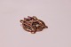 Beautiful brooch decorated with different stones.