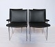 Sæt af 4 Lufthavnsstole, model AP37, i sort klassisk læder af Hans J. Wegner og AP Stolen.5000m2 udstilling.