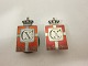 Royal batch made of Sterling silver 925S with red enamel motif of the DannebrogThis batch is made for the buttonholeYear 1870-1940 is on as well as Christian XThe Silver smithy of Georg Jensen produced it in 1940-47