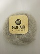 Brushed Lace er et naturprodukt af højeste kvalitet fra  sydafrikanske angorageder blandet med den fineste Mulberry Silke.Den viste farve er: Sand, Farvenr. 3005Prisen er pr. nøgle med 25 gram Brushed Lace