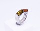 Ring af 925 sterling sølv dekoreret med rav.