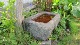 Trough made of red granite, antiqueThe trough is made of grey granite, - a so-called dog troughAbout 1780-1820L: 38cmW: 33cmH: 30cmWe have a large choice of good, antique, Danish troughs, millstones, saddle querns etc.Please contact us