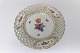 Royal Copenhagen. Saksisk blomst. Middagstallerken med gennembrudt kant. Model 1221-1636. Diameter 25 cm. (1 sortering)