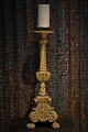 Antique French altar candlestick in carved wood with a super fine patinaH:62cm.