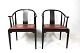 Et par Kinastole i sort farvet ask af Hans J. Wegner og Fritz Hansen, 2013.5000m2 udstilling.