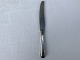 Double knurled dinner knife with silver handle* 400 DKK