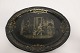 Tray made of metalThis tray is with a beautiful print which very good illustrates the daily life at that timeAbout 1900L: 30cm B: 23,5cmIn a good condition, but with a few small marks at the border