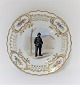 Royal Copenhagen. Tallerken med gennemskåret roset. Diameter 19 cm. Motiv ; brandmand. Produceret før 1923.