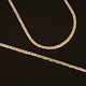 Smykkesæt i 14kt guld bestående af collier og armlænke i rødt, hvidt og gult guld. L halskæde: 44,5cm. L armlænke: 20cm
