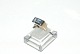 Elegant ring with light blue stones in 14 carat goldSize 53