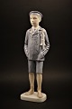 Sjælden porcelæns figur fra Bing & Grøndahl ( år 1915 ) af dreng med skøjter. H:29,5cm...