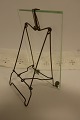 Photo frame, antiqueThis frame is made of thick glass with a stand made of brass which can be folded upAbout the beginning of the 1900-yearsAbout 18cm x 11cmIn a good conditionWe have a large choice